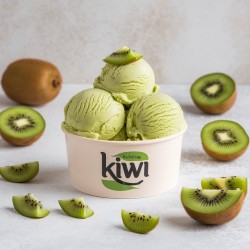 Pâte aromatisante Kiwi 1,4 kg Bigatton — glace au kiwi en coupe avec tranches de kiwi et kiwi entier