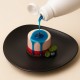 Blue Topping 4A Bigatton — topping poured over dessert