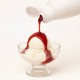 Topping Fresa 10N Bigatton — topping vertido sobre helado