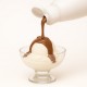 Nocciolita Topping 1215N Bigatton — topping poured over ice cream