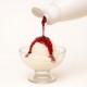Topping Frambuesa 13N Bigatton — topping vertido sobre helado