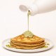 Topping Pistáchio 19N Bigatton — topping vertido sobre crepes