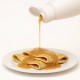 Topping Baunilha Premium 16N Bigatton — topping vertido sobre crepes