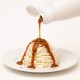 Haselnuss-Topping 18N Bigatton — Topping über Eisdessert gegossen
