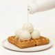 Topping Panna Cotta 337N1 Bigatton — topping vertido sobre waffle